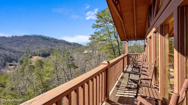 balcony featuring a mountain view