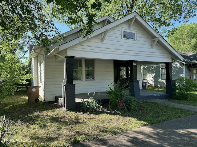 bungalow-style home featuring a porch