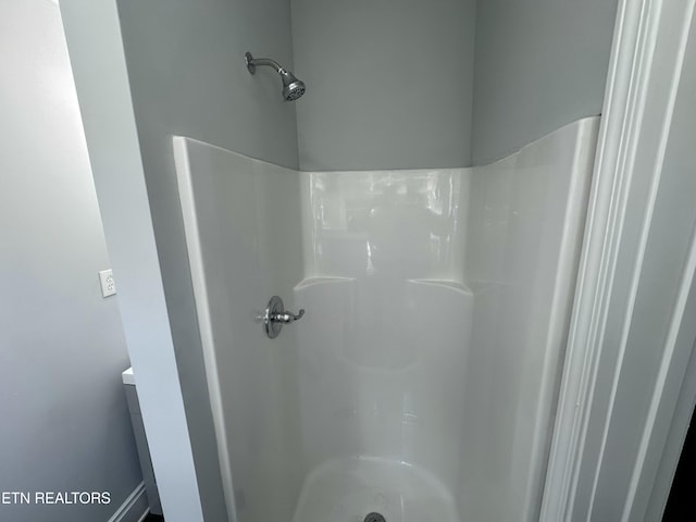 bathroom with walk in shower