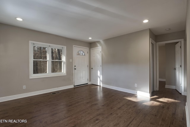 foyer featuring dark wood-type flooring