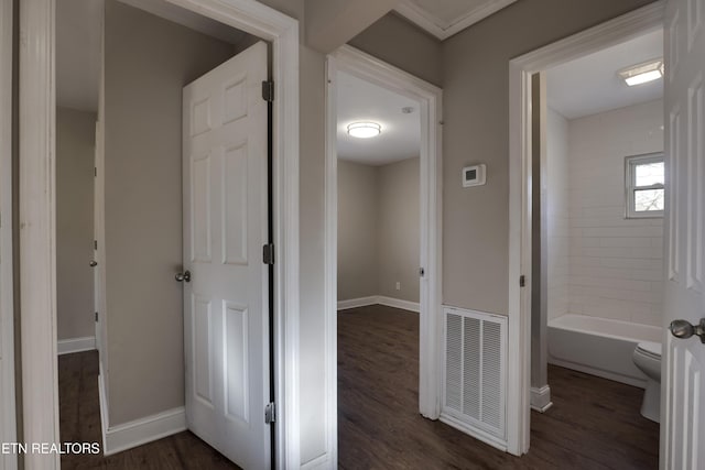 corridor with dark wood-type flooring