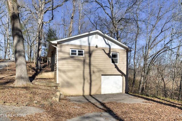 view of home's exterior with a garage