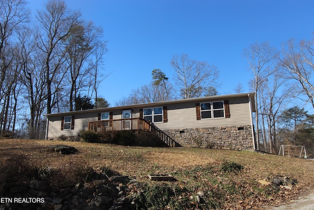 view of front of home featuring a deck