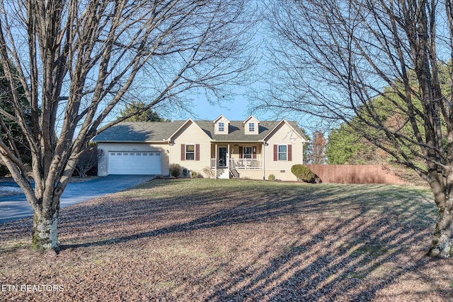 view of front facade with a garage and a porch