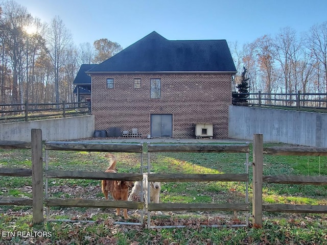 view of home's exterior featuring an outbuilding