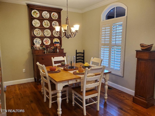 dining space featuring ornamental molding, dark hardwood / wood-style floors, and a notable chandelier