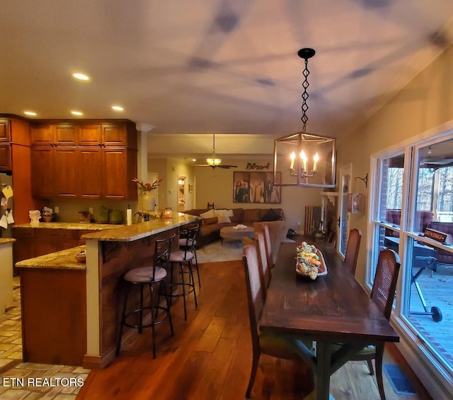 dining space featuring dark hardwood / wood-style floors