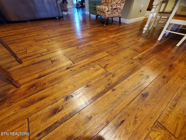 details featuring hardwood / wood-style flooring