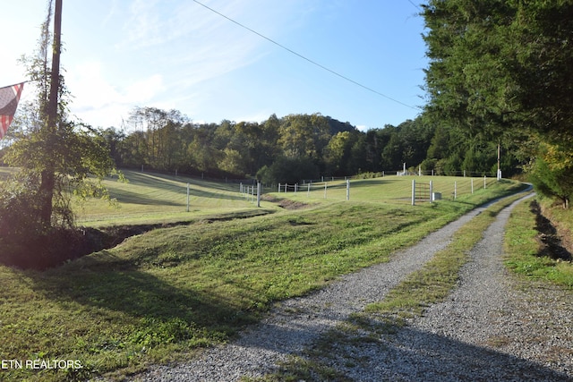 exterior space with a rural view