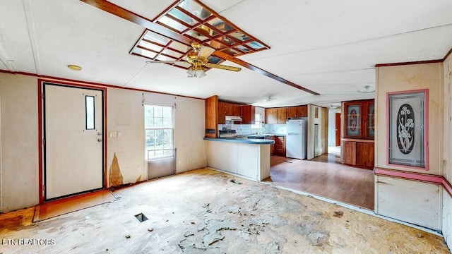 kitchen with crown molding, ceiling fan, electric range, white refrigerator, and kitchen peninsula