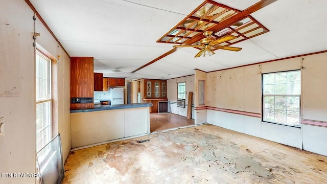 kitchen with white refrigerator and ceiling fan