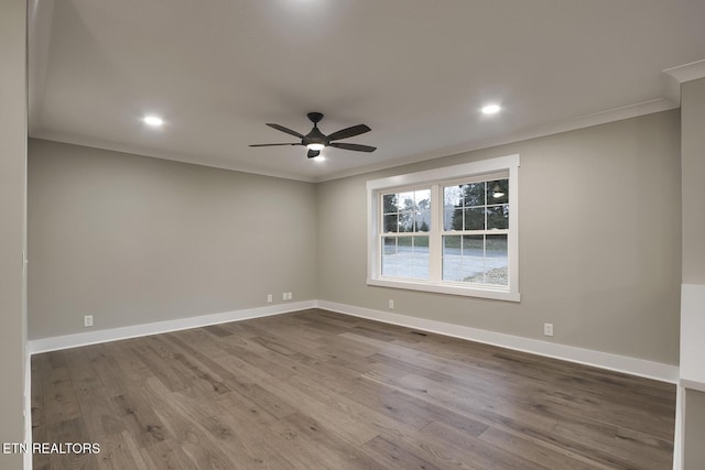 unfurnished room featuring crown molding, ceiling fan, and hardwood / wood-style flooring