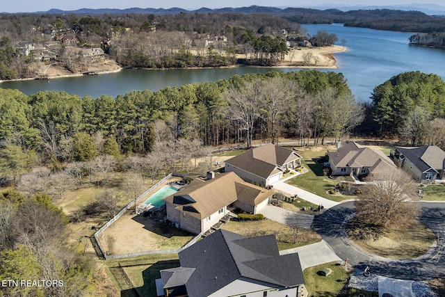 drone / aerial view with a water view