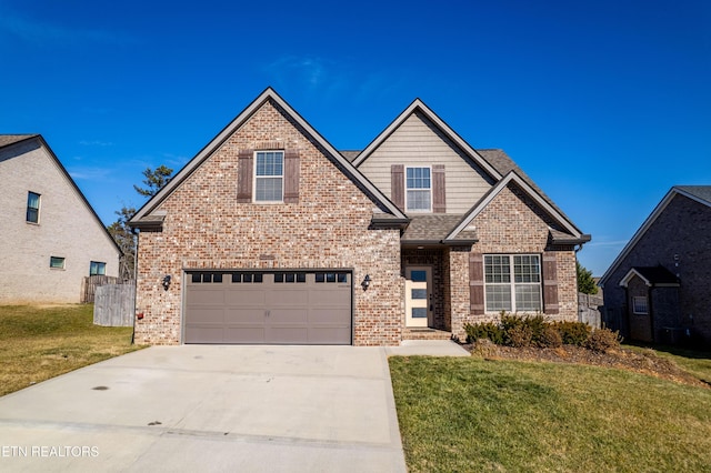 front facade featuring a garage and a front yard