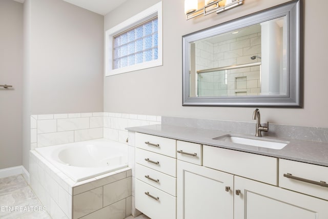 bathroom with vanity and plus walk in shower