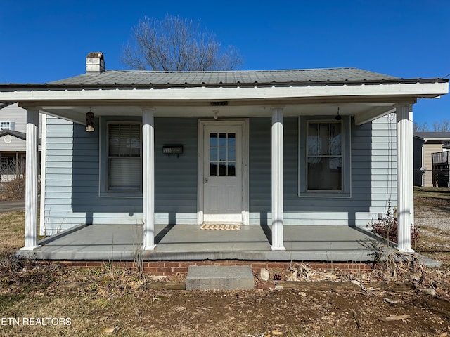 entrance to property with covered porch