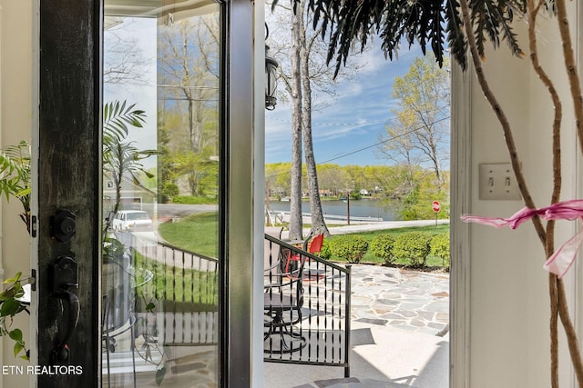 entryway with a water view