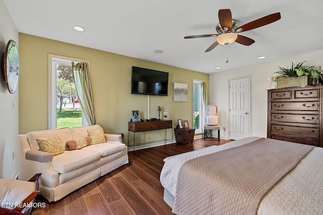 bedroom with a ceiling fan, recessed lighting, and wood finished floors