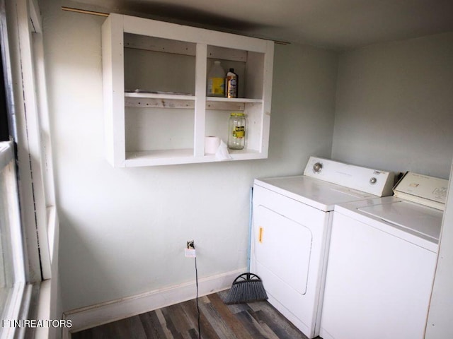 laundry area featuring dark wood-type flooring and independent washer and dryer