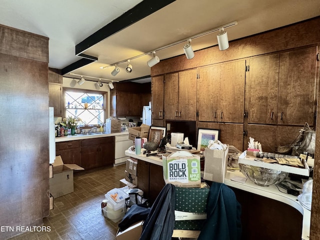 kitchen featuring sink and dishwasher