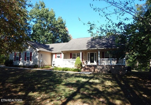 view of front of house featuring a front lawn and a porch