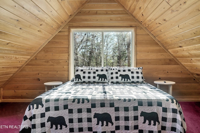 bedroom with wood ceiling, lofted ceiling, and wooden walls