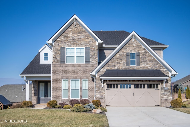 craftsman house with driveway, a shingled roof, metal roof, a front lawn, and brick siding