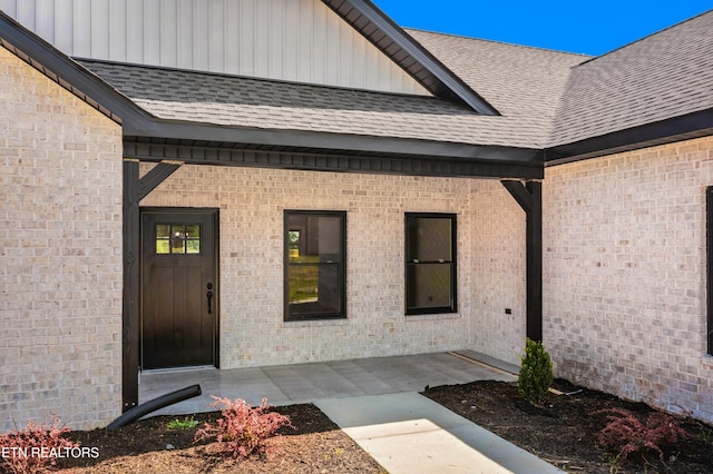 doorway to property featuring a patio area