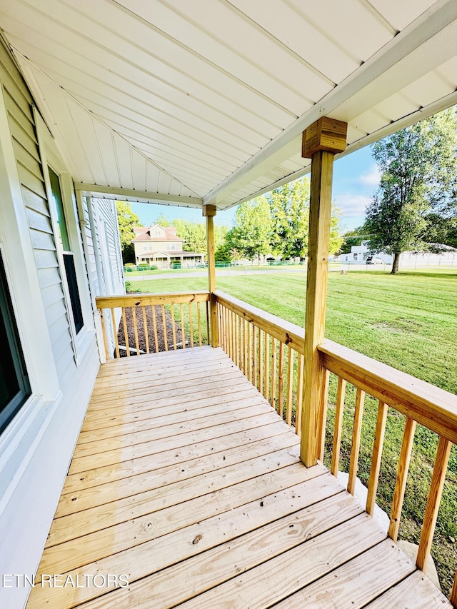 deck featuring a yard