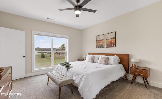 carpeted bedroom with ceiling fan