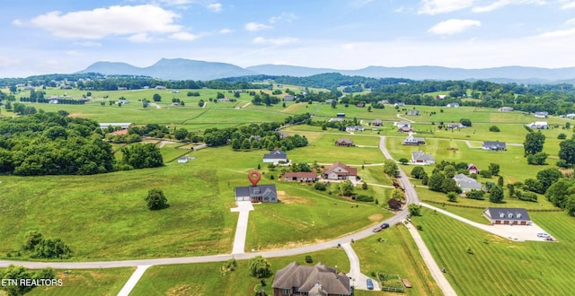 aerial view featuring a mountain view and a rural view