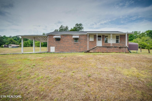 view of front of home with a porch and a front lawn