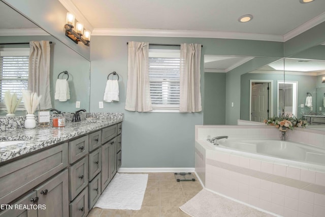 bathroom with tile patterned flooring, crown molding, a relaxing tiled tub, and vanity