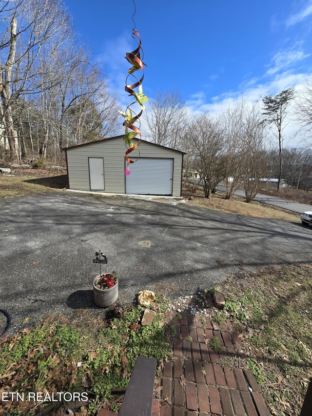 detached garage with driveway