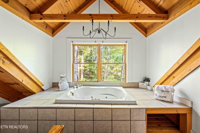 bathroom featuring a whirlpool tub, wood ceiling, an inviting chandelier, and lofted ceiling with beams