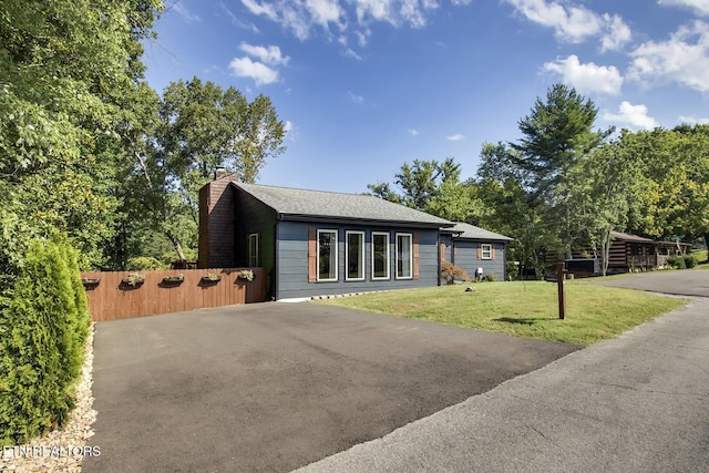 view of front of house with a front lawn