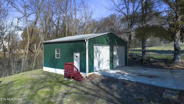 view of outdoor structure with a garage