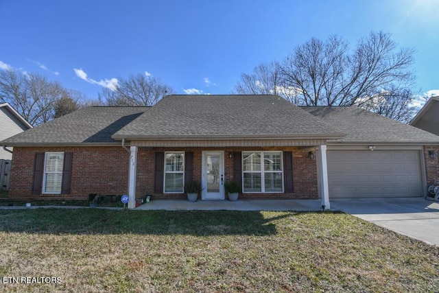 ranch-style house with a porch, a garage, and a front yard