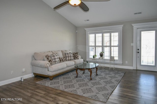 living room with ceiling fan, lofted ceiling, and dark hardwood / wood-style flooring