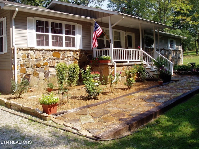 ranch-style house with a porch