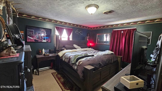 carpeted bedroom with a textured ceiling