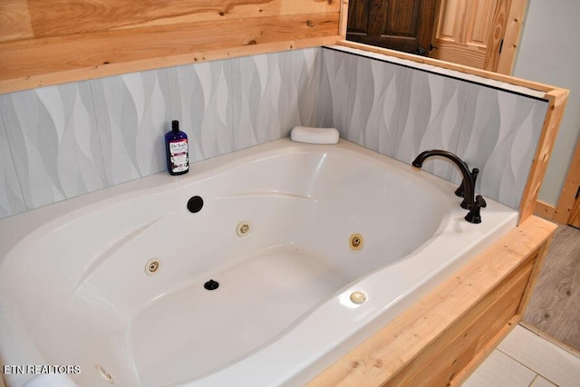 bathroom featuring a tub