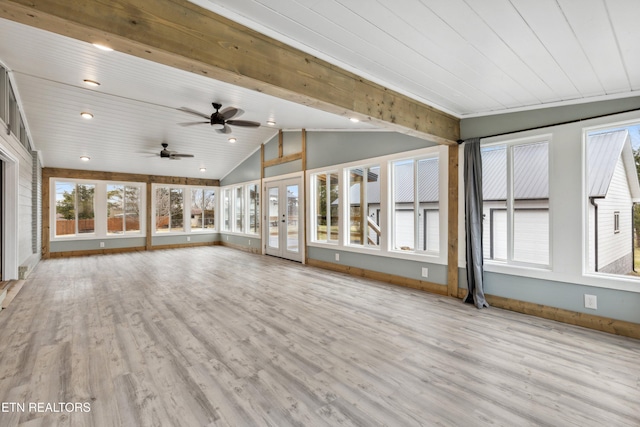 unfurnished sunroom with wooden ceiling and lofted ceiling with beams