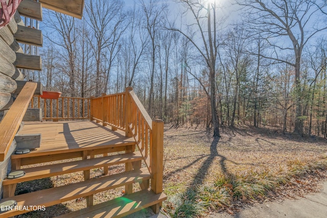 view of yard featuring a wooden deck