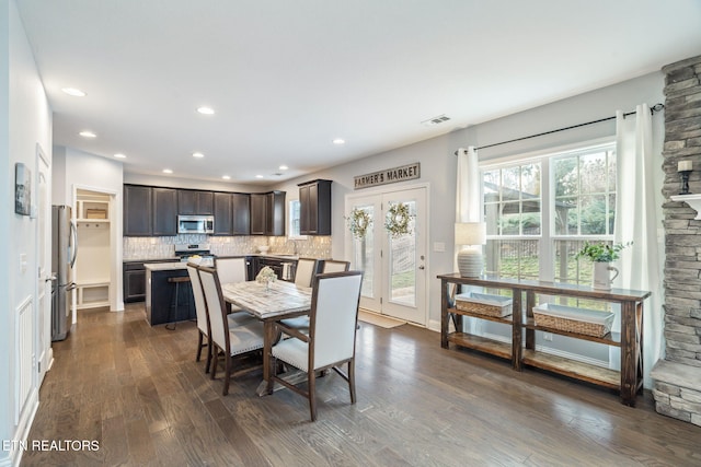 dining area with dark wood-type flooring