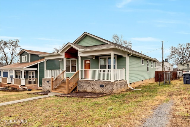 view of front facade featuring a porch and a front yard