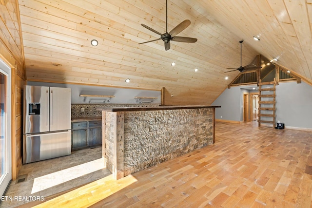 unfurnished living room featuring wood ceiling, vaulted ceiling, and light hardwood / wood-style floors