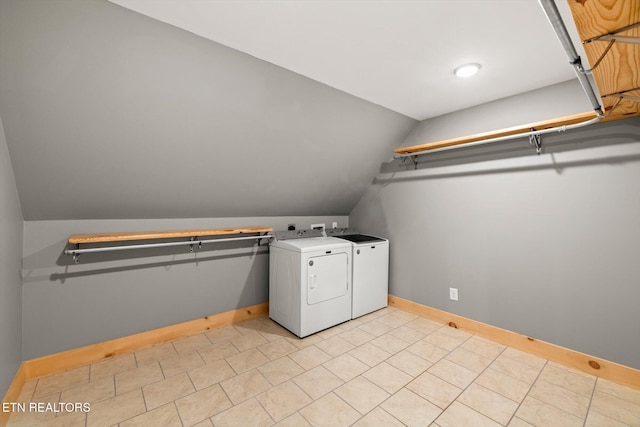 laundry area with independent washer and dryer