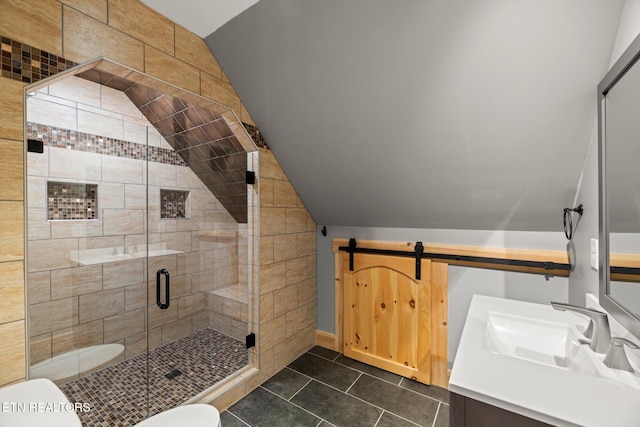 bathroom featuring walk in shower, vanity, toilet, and vaulted ceiling