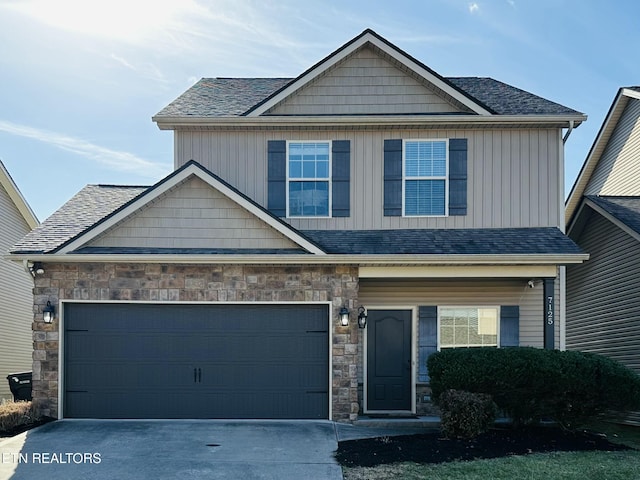 craftsman-style house featuring a garage